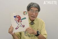 <div class="caption">カープ坊やをデザインした岡崎さん。現在も広島でイラストレーターとして活動している</div>